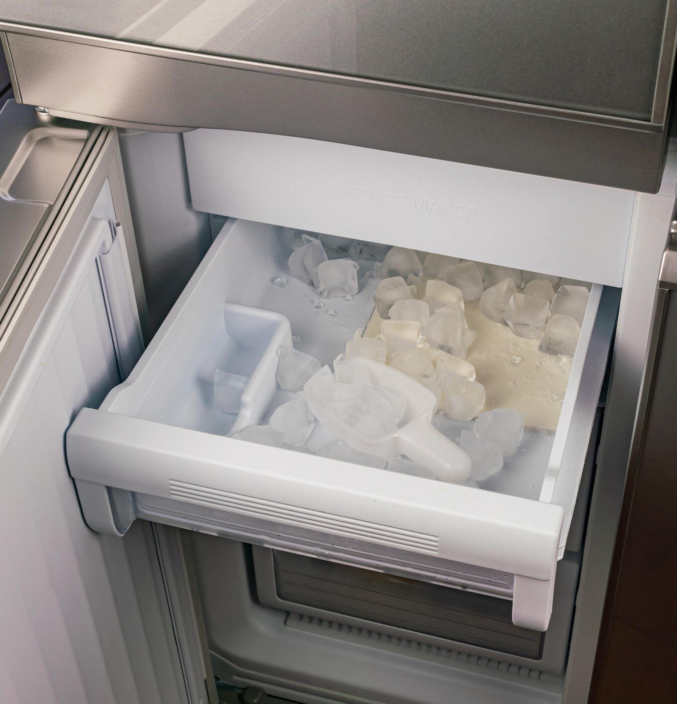 Freezer drawer containing ice cubes